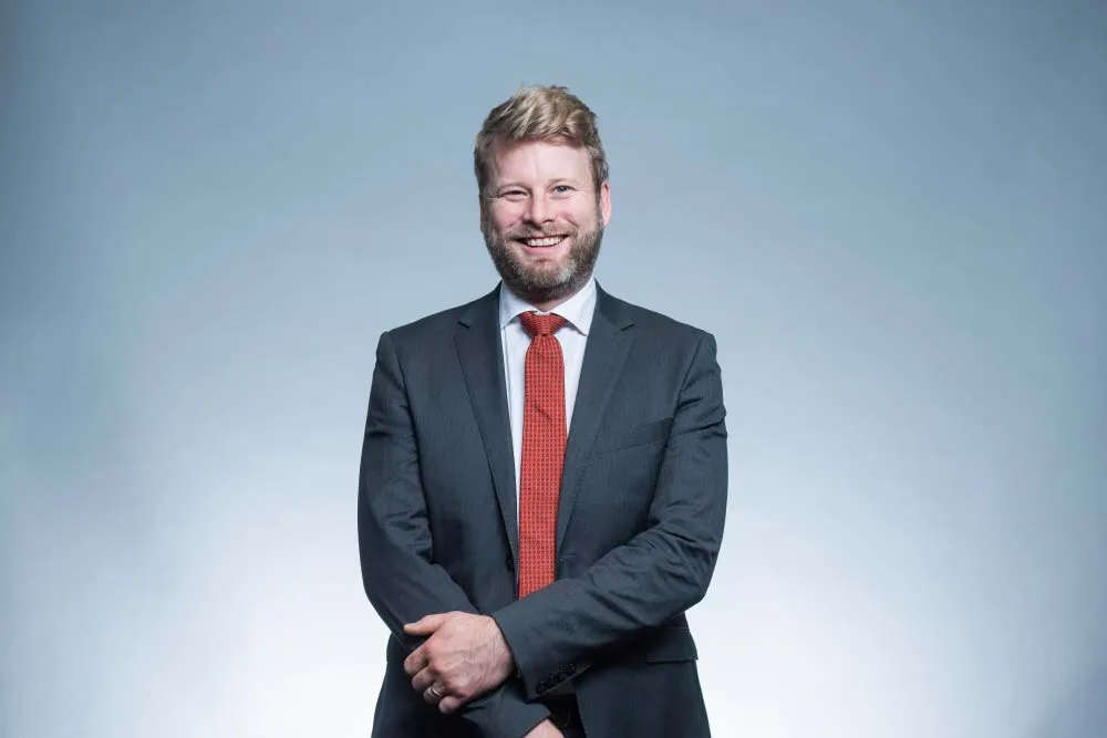 Photo de d'un mur avec le logo Be audit