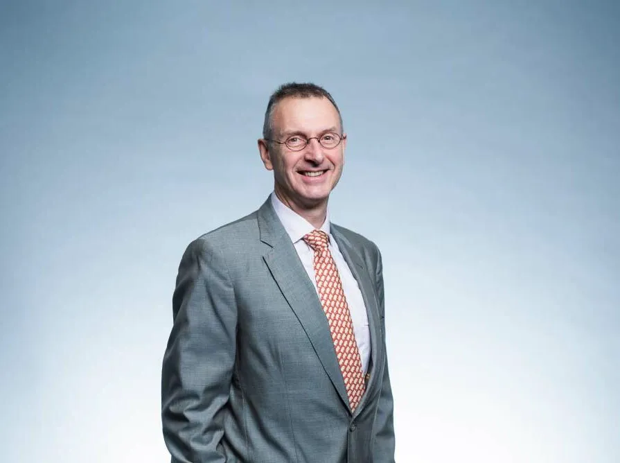 Photo de d'un mur avec le logo Be audit