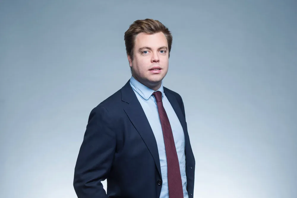 Photo de d'un mur avec le logo Be audit